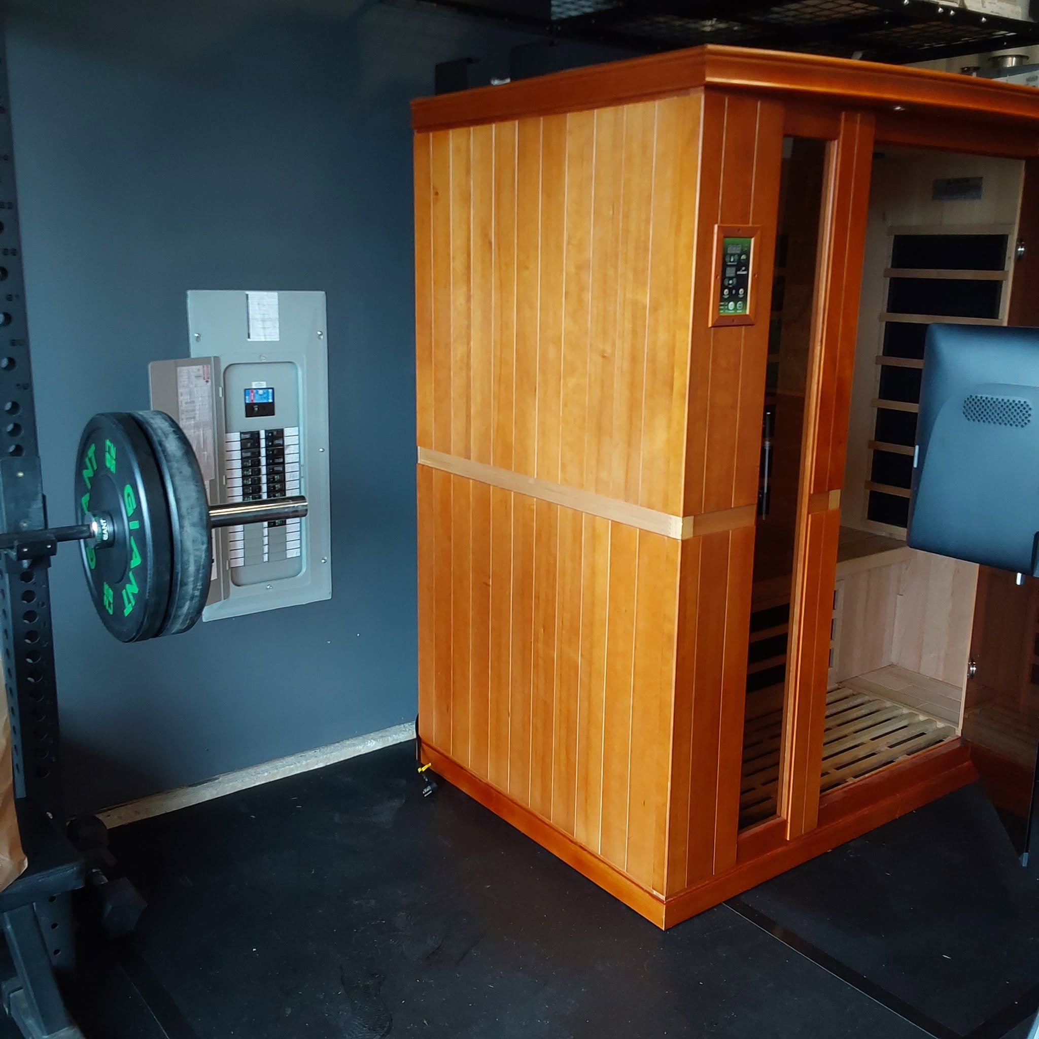 Indoor sauna with a dedicated electrical panel and professionally installed wiring in a Graham, WA home.